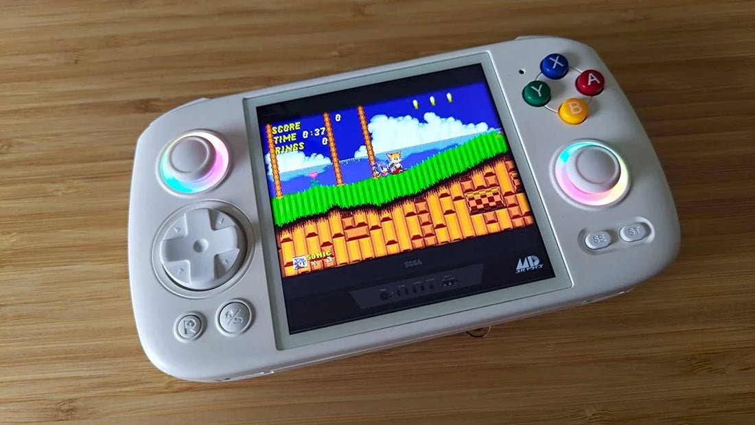 Side-by-side comparison of the 1:1 square screen Anbernic RG Cube handheld and the 4:3 vertical 2Bluebox R36S console