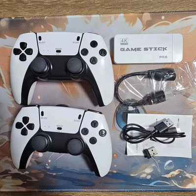 White 2Bluebox Retro Game Stick 4K Pro and two white-and-black 2.4GHz wireless controllers beside a television