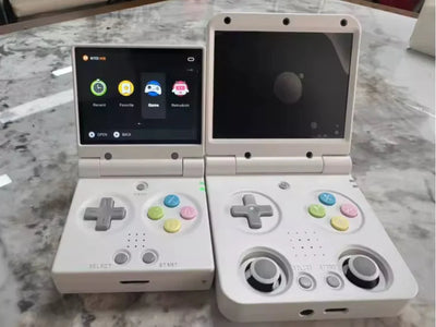 2Bluebox R36S vertical handheld next to a clamshell retro handheld showing unibody vs hinged shell design