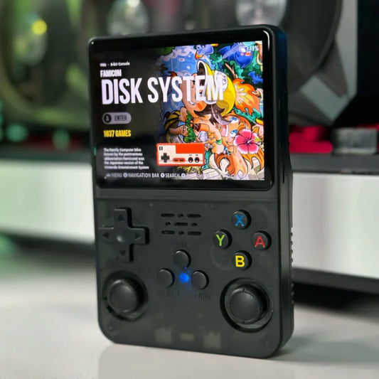 Retro Games Official review comparison showing a 2Bluebox Game Stick 4K Pro and R36S handheld console