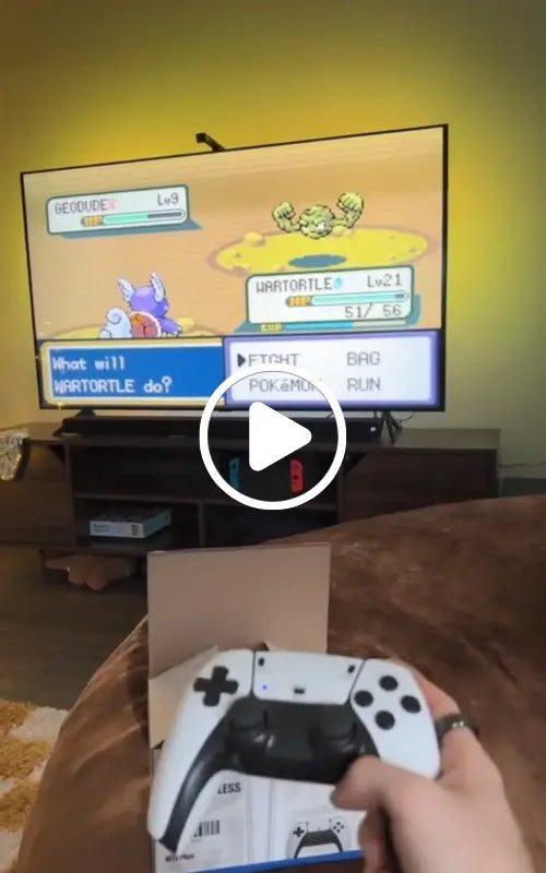 Person playing a video game on a TV with 2Bluebox Retro Game Console