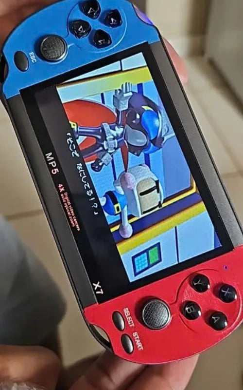 Blue and Red X7 game console displaying Bomberman Jetters gameplay on 4.3 inch widescreen.